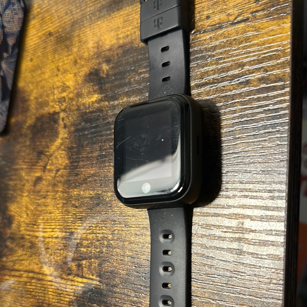 Black Smartwatch Kids TMobile SyncUp with extra face band colors